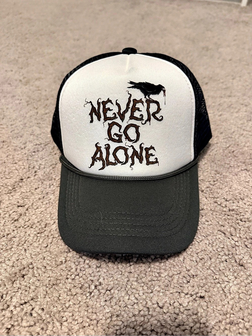 Universal Studios Halloween Horror Nights 2025 Never Go Alone Trucker Hat